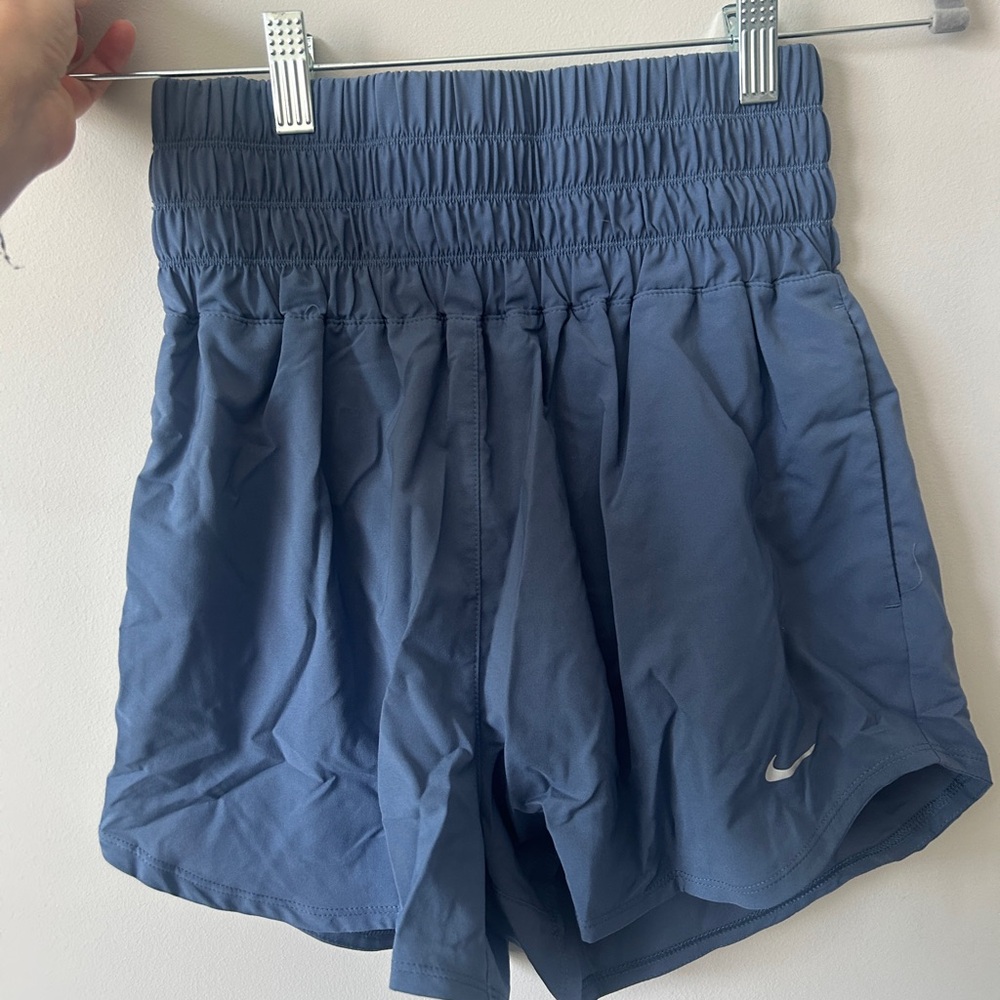 Nike athletic shorts. High waisted. Never worn.